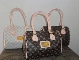 Bolsa Louis Vuitton Baú