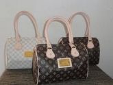 Bolsa Louis Vuitton Baú